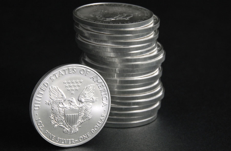 stack of one ounce fine silver one dollar coin